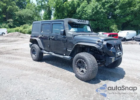 2011 Jeep Wrangler Unlimited Sport z USA, uszkodzony, nr VIN 1J4HA3H14BL510197